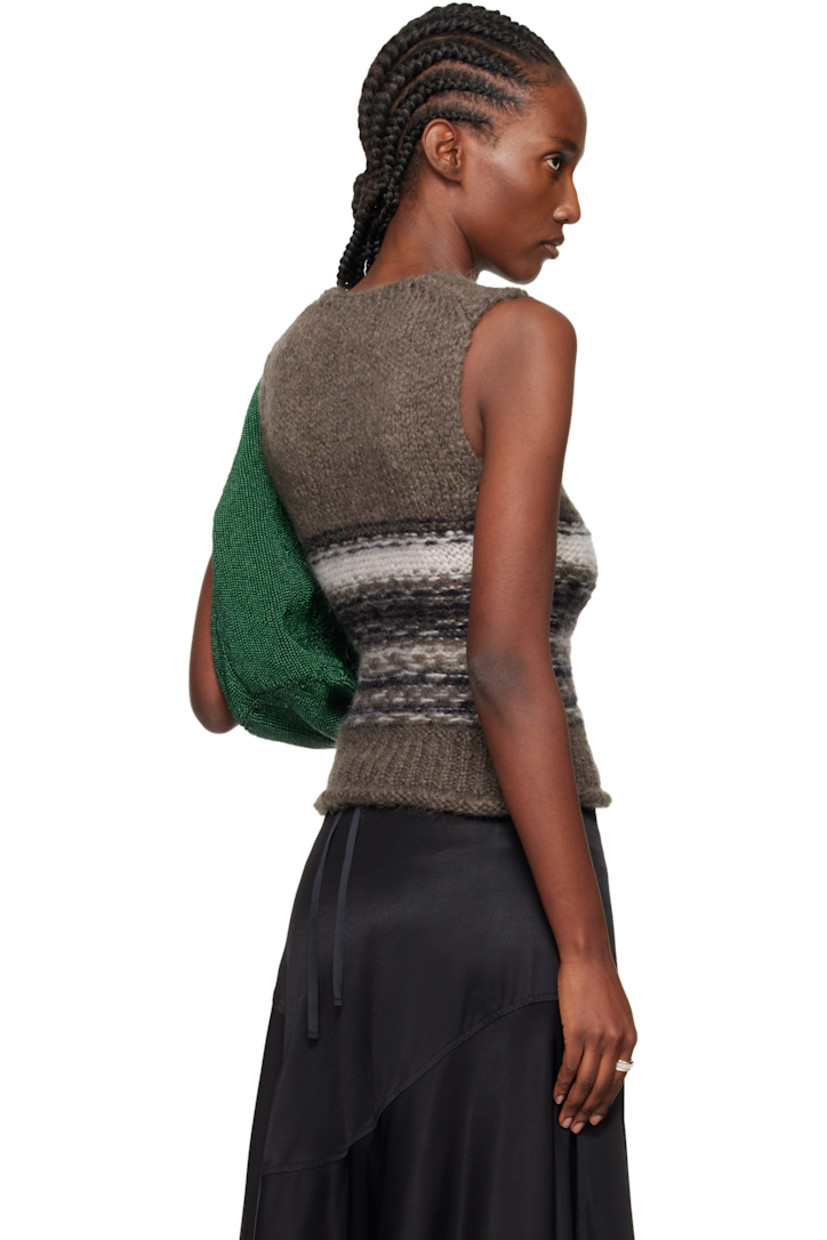 Knit mohair- and wool-blend vest.

· Intarsia knit stripes throughout
· Crewneck
· Rolled edge at rib-knit hem

Supplier color: Blur fair isle