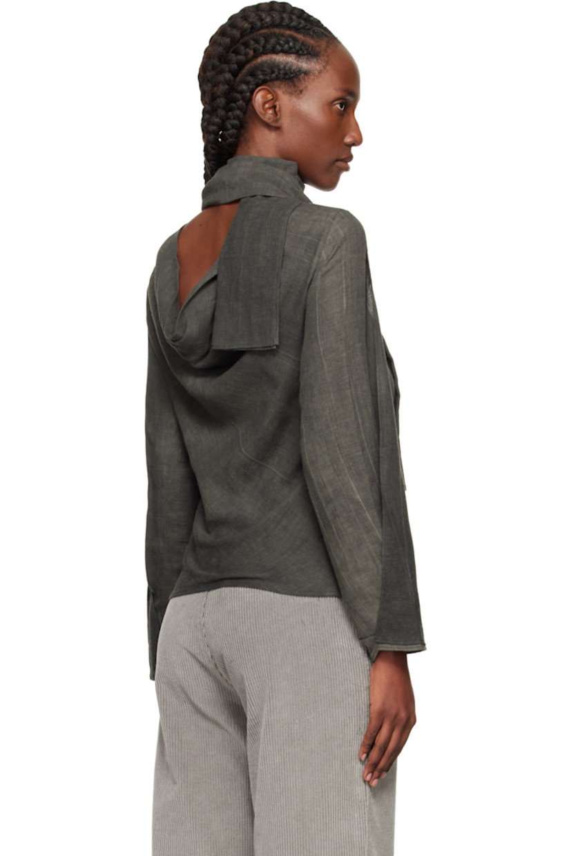 Knit cotton- and wool-blend blouse. 

· Fading throughout 
· Mock neck with wraparound panel 
· Dropped shoulders
· Cutout at sleeves
· Draping at back 

Supplier color: Dark cloud sparse cotton wool