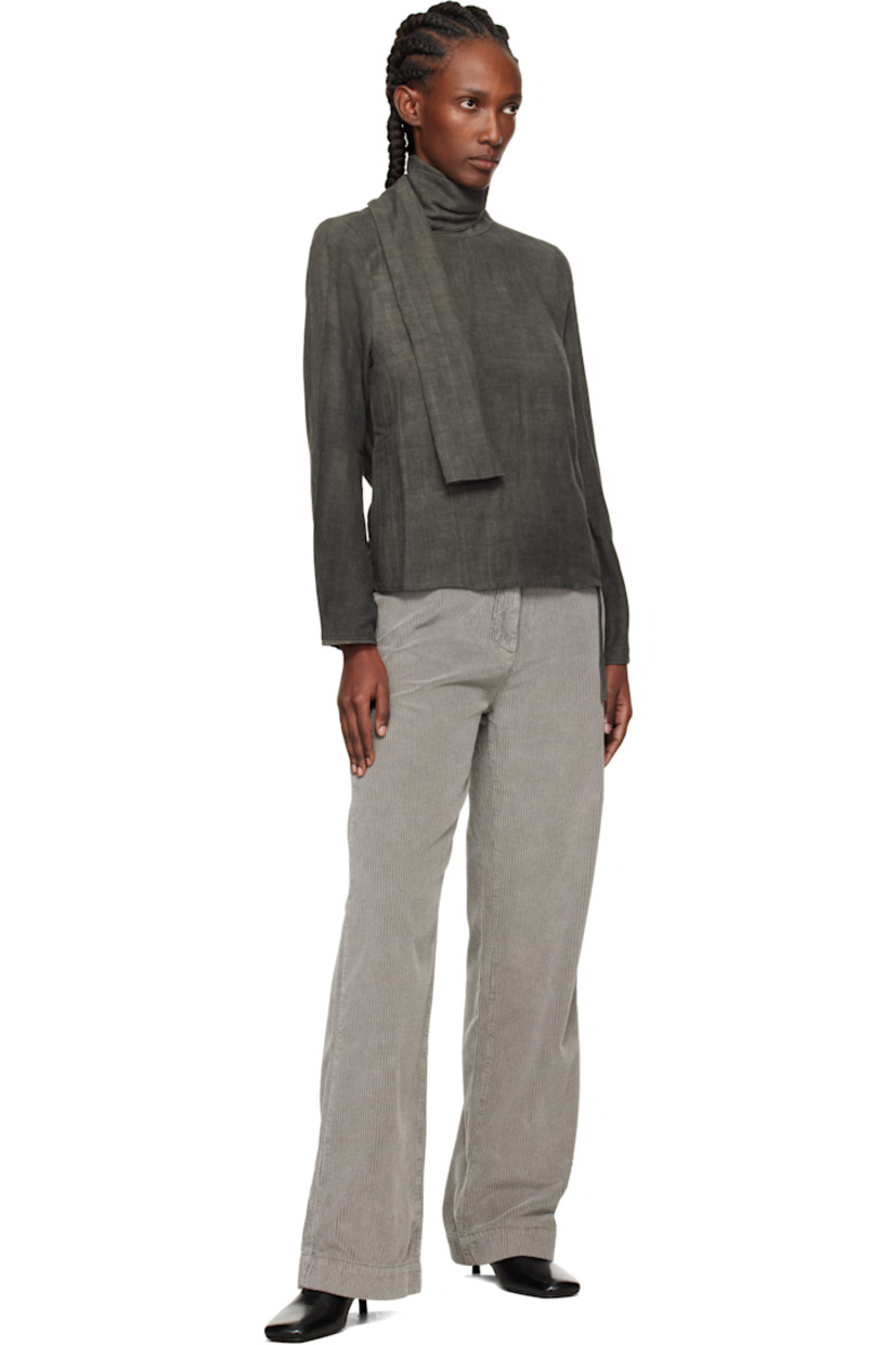 Knit cotton- and wool-blend blouse. 

· Fading throughout 
· Mock neck with wraparound panel 
· Dropped shoulders
· Cutout at sleeves
· Draping at back 

Supplier color: Dark cloud sparse cotton wool