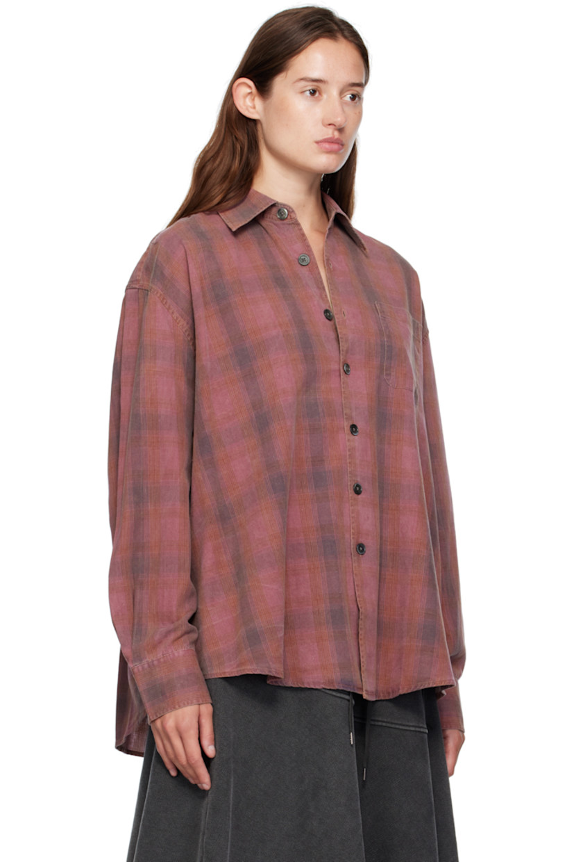 Cotton flannel shirt.

· Check pattern throughout
· Spread collar
· Button closure
· Patch pocket at chest
· Shirttail hem
· Dropped shoulders
· Buttoned barrel cuffs
· Box pleat at back yoke
· Mother-of-pearl hardware

Supplier color: Idaho flannel check