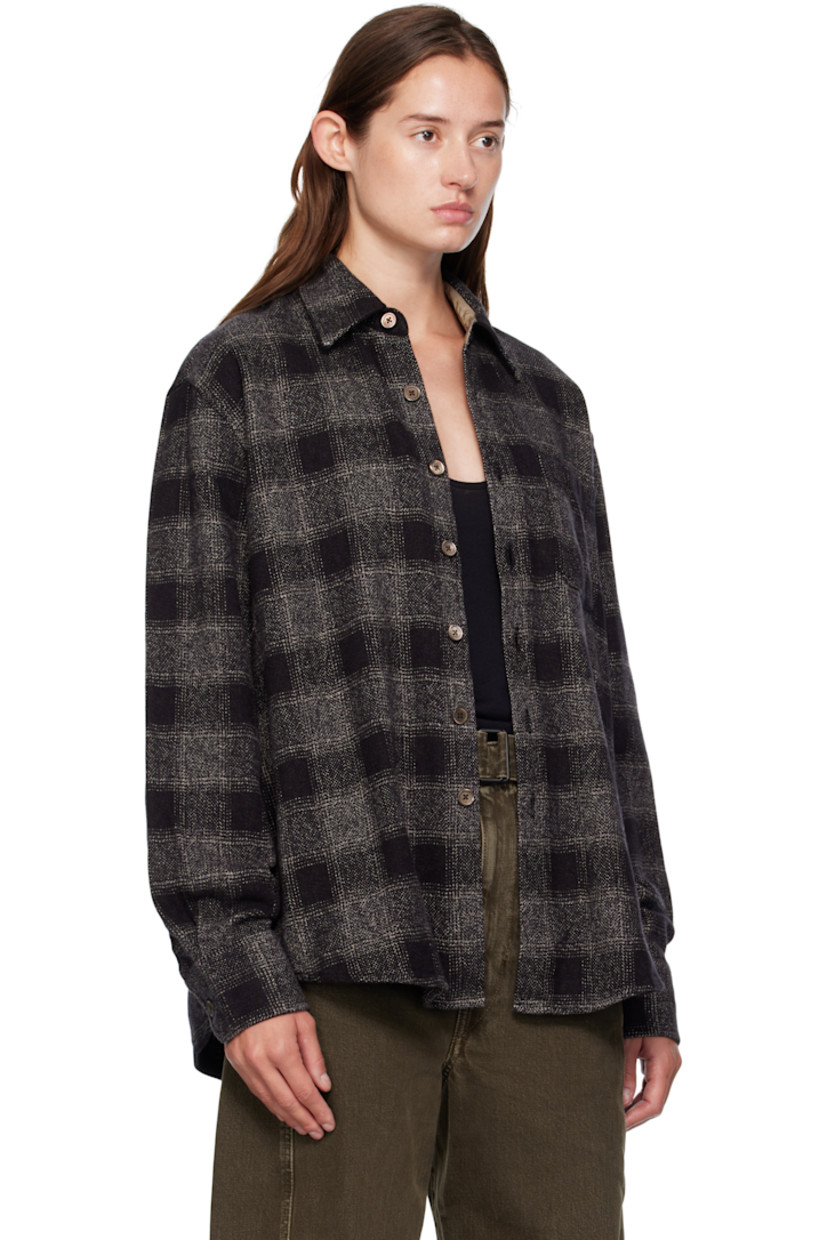 Cotton flannel shirt.

· Check pattern throughout
· Spread collar
· Button closure
· Patch pocket at chest
· Shirttail hem
· Buttoned barrel cuffs
· Box pleat at back yoke
· Mother-of-pearl hardware

Supplier color: Oakland low twist check