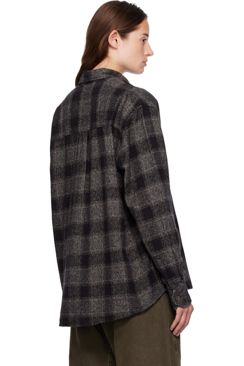 Cotton flannel shirt.

· Check pattern throughout
· Spread collar
· Button closure
· Patch pocket at chest
· Shirttail hem
· Buttoned barrel cuffs
· Box pleat at back yoke
· Mother-of-pearl hardware

Supplier color: Oakland low twist check