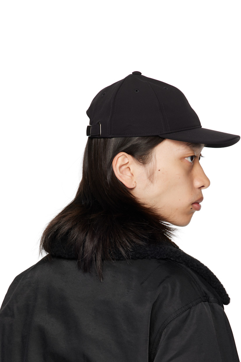 Stretch nylon taffeta cap.

· Embroidered eyelets at crown
· Curved brim
· Cinch fastening

Supplier color: Pitch black muted scuba