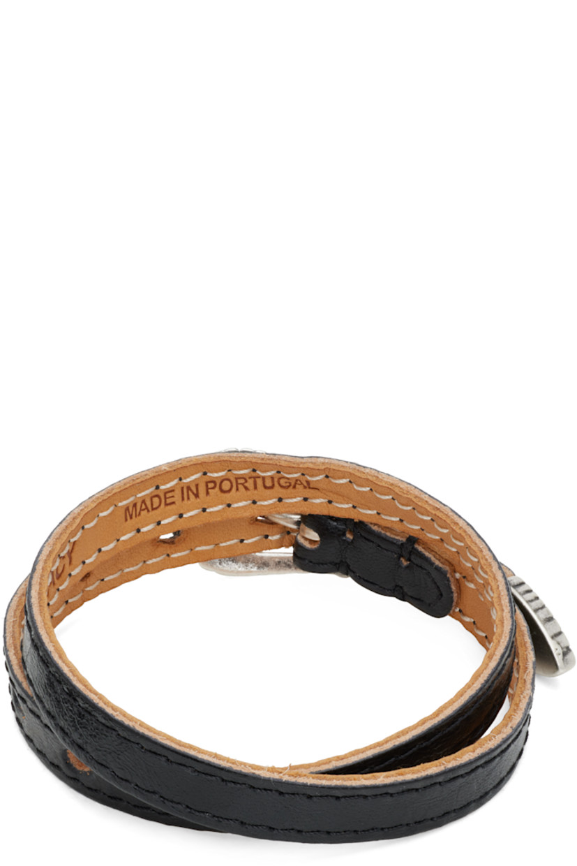 Wraparound grained calfskin bracelet in black.

· Pin-buckle fastening
· Engraved silver-tone hardware
· L18"

Supplier color: Pomice grey fluid calfskin