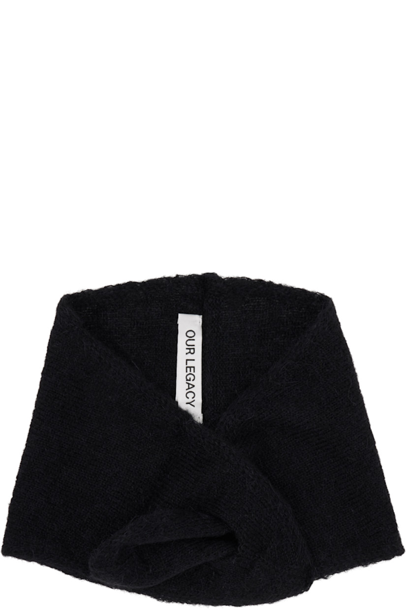 Knit alpaca-blend scarf. 

· Cutout at end
· Exposed and rolled central seam
· L27" x W8"

Supplier color: Black fuzzy alpaca