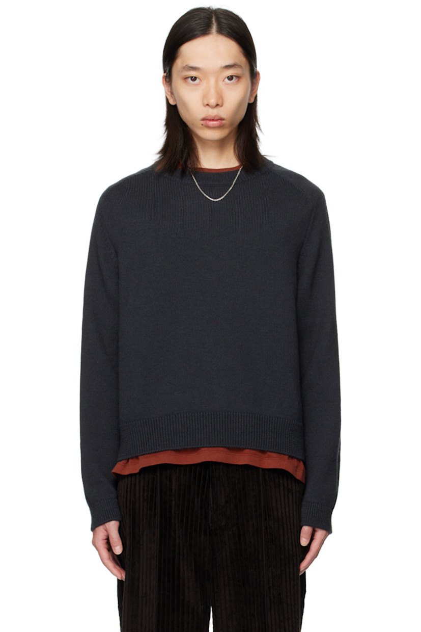 Knit wool sweater. 

· Rib-knit round neck, hem, and cuffs
· Saddle shoulders
· Drop stitch detailing at sleeves 

Supplier color: Off black rustic merino