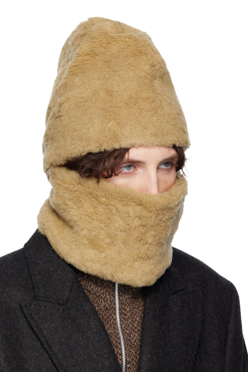 Wool- and alpaca-blend fleece snood. 

· Cutout at face
· Fully lined

Supplier color: Dusty natural curly