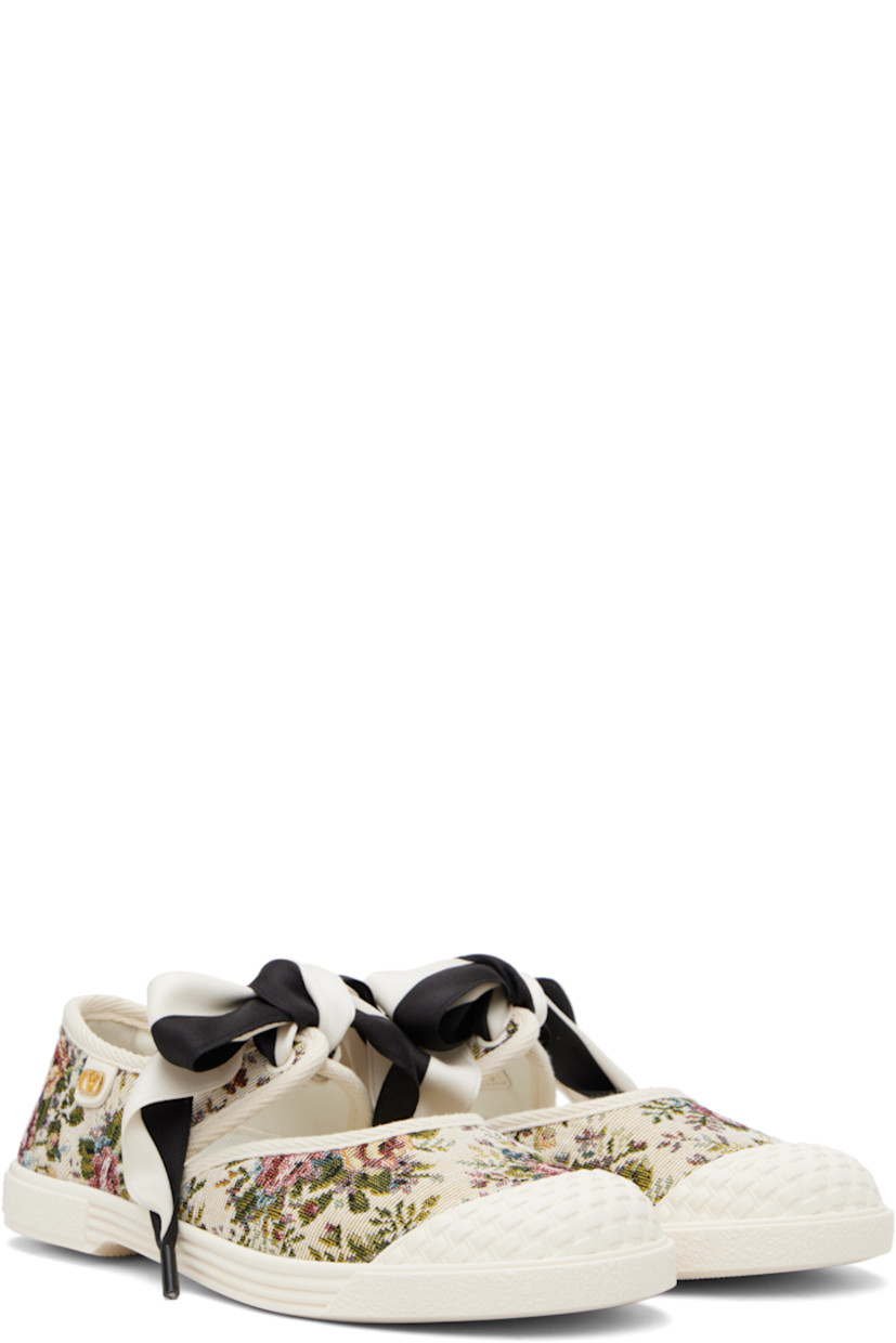 Canvas ballerina flats.

· Jacquard floral pattern throughout 
· Textured rubber cap toe 
· Satin self-tie fastening at vamp
· Logo hardware at outer side 
· Treaded rubber sole 

Supplier color: Beige/Multicolor