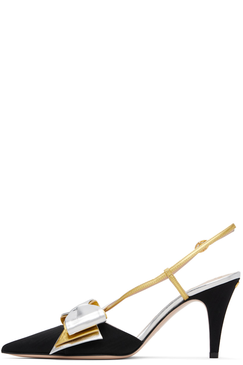 Moiré and grained nappa sheepskin heels. 

· Pointed toe 
· Cutout and layered bow accents at vamp 
· Crisscrossing straps 
· Pin-buckle slingback strap
· Logo and graphic at footbed
· Logo hardware at heel 
· Covered stiletto heel with rubber injection
· Leather sole 
· Gold-tone hardware
· Heel: H3.5"

Supplier color: Black/Silver/Antique gold