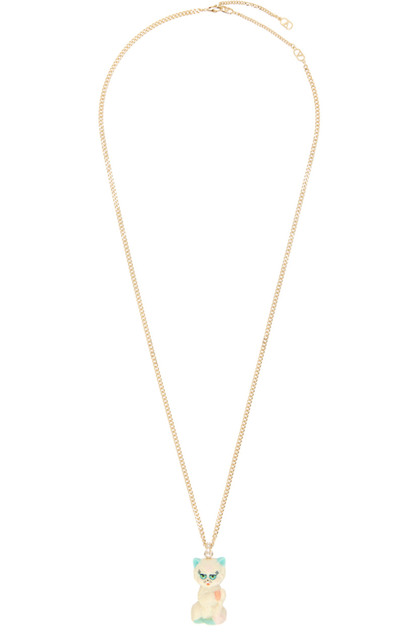 Curb chain necklace in gold tone. 

· Crystal-cut accents at graphic pendant 
· Logo charms at adjustable lobster-clasp fastening 
· L29"

Supplier color: Oro/Crystal/Multi