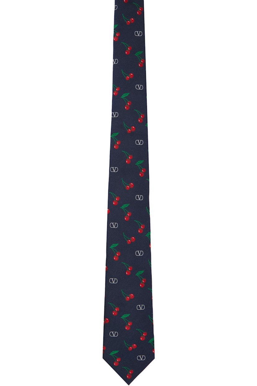 Yarn-dyed silk faille tie. 

· Jacquard logo graphic pattern throughout 
· Keeper loop at back face
· W3"

Supplier color: Nvy/Brr/Ross/Vrd