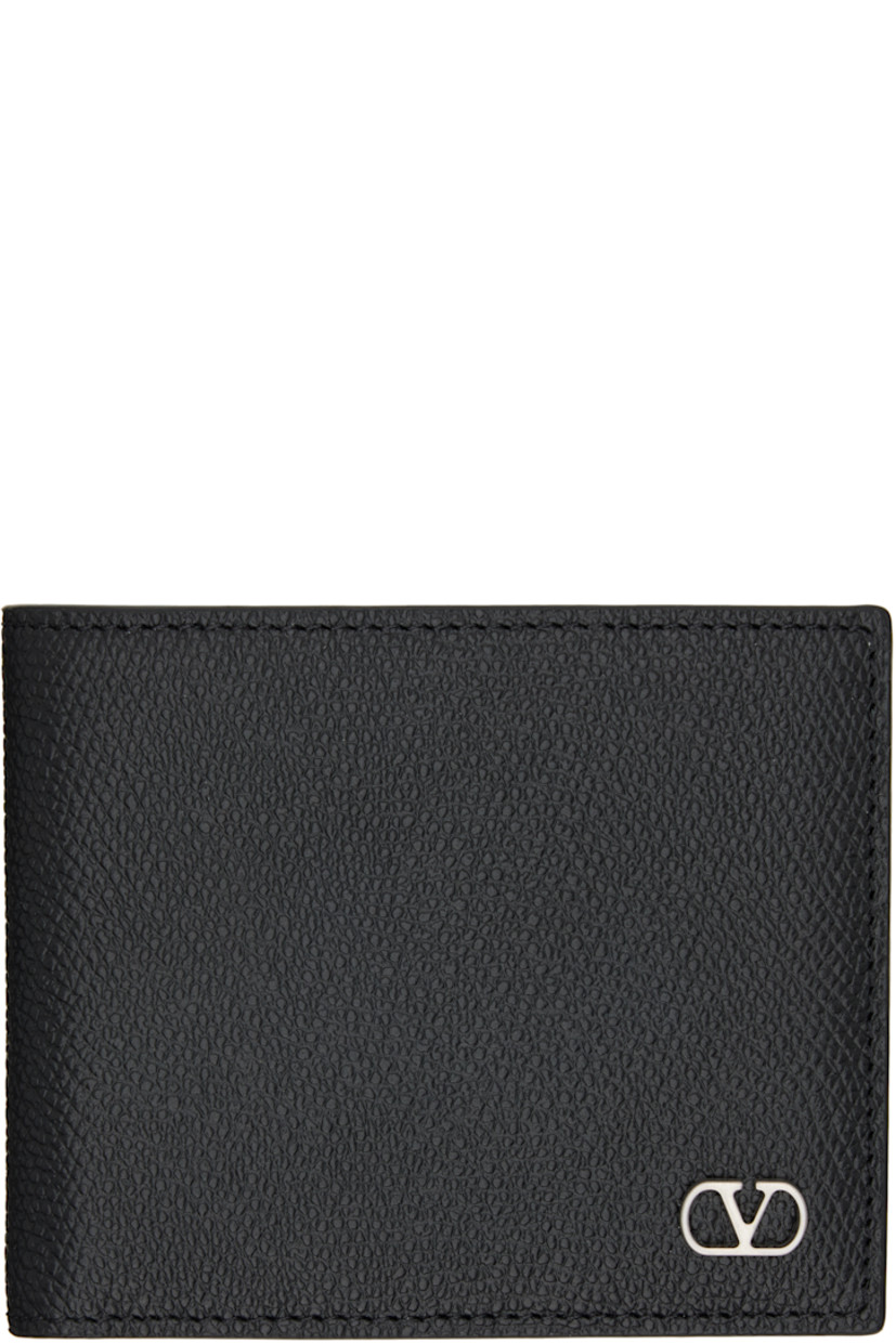 Pebble-grained calfskin bifold wallet. 

· Logo hardware at face
· Eight card slots at interior 
· Two patch pockets and one note slot
· Canvas lining 
· Silver-tone hardware
· H3.5" x W4" x D0.75"

Supplier color: Nero