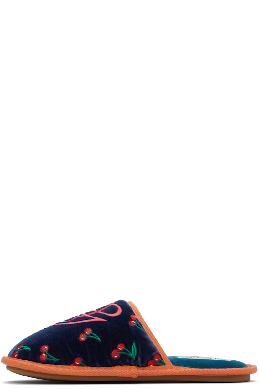 Padded velvet slippers. 

· Graphic pattern embroidered throughout
· Logo embroidered at vamp
· Logo patch at padded footbed
· Logo-treaded rubber sole

Supplier color: Indigo/Red/Green