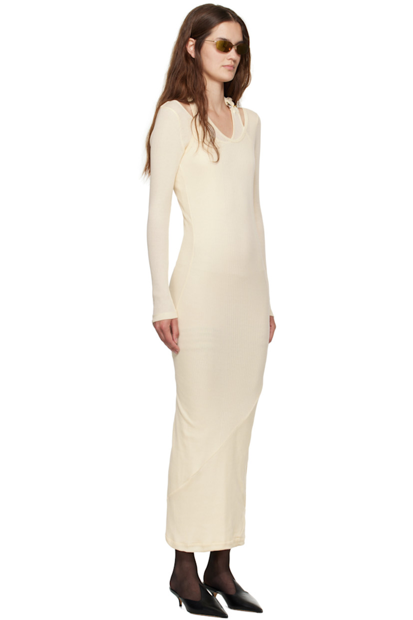 Rib-knit cotton midi dress.

· Asymmetrical and layered construction
· Scoop neck
· Logo hardware and extended trim at halter strap

Supplier color: Ecru