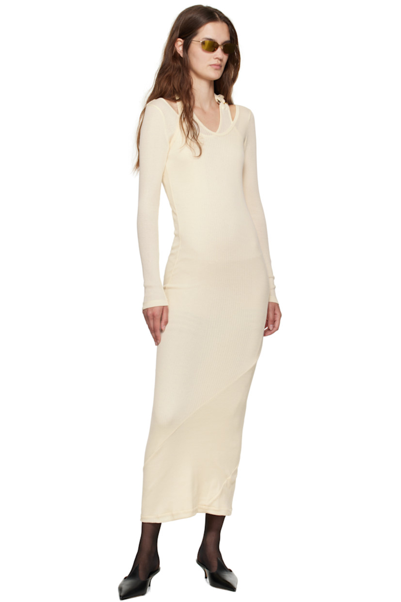 Rib-knit cotton midi dress.

· Asymmetrical and layered construction
· Scoop neck
· Logo hardware and extended trim at halter strap

Supplier color: Ecru