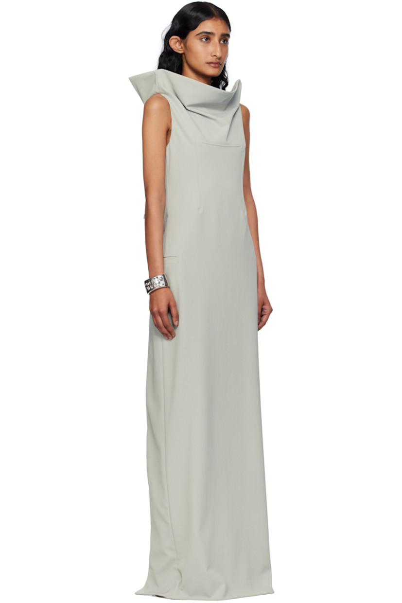 Stretch nylon twill maxi dress.

· Funnel neck
· Darts at chest
· Welt pocket at side seams
· Extended trim with underwire at open back
· Post-stud strap and cutout at back
· Zip closure at back
· Central vent at back hem
 
Supplier color: Grey