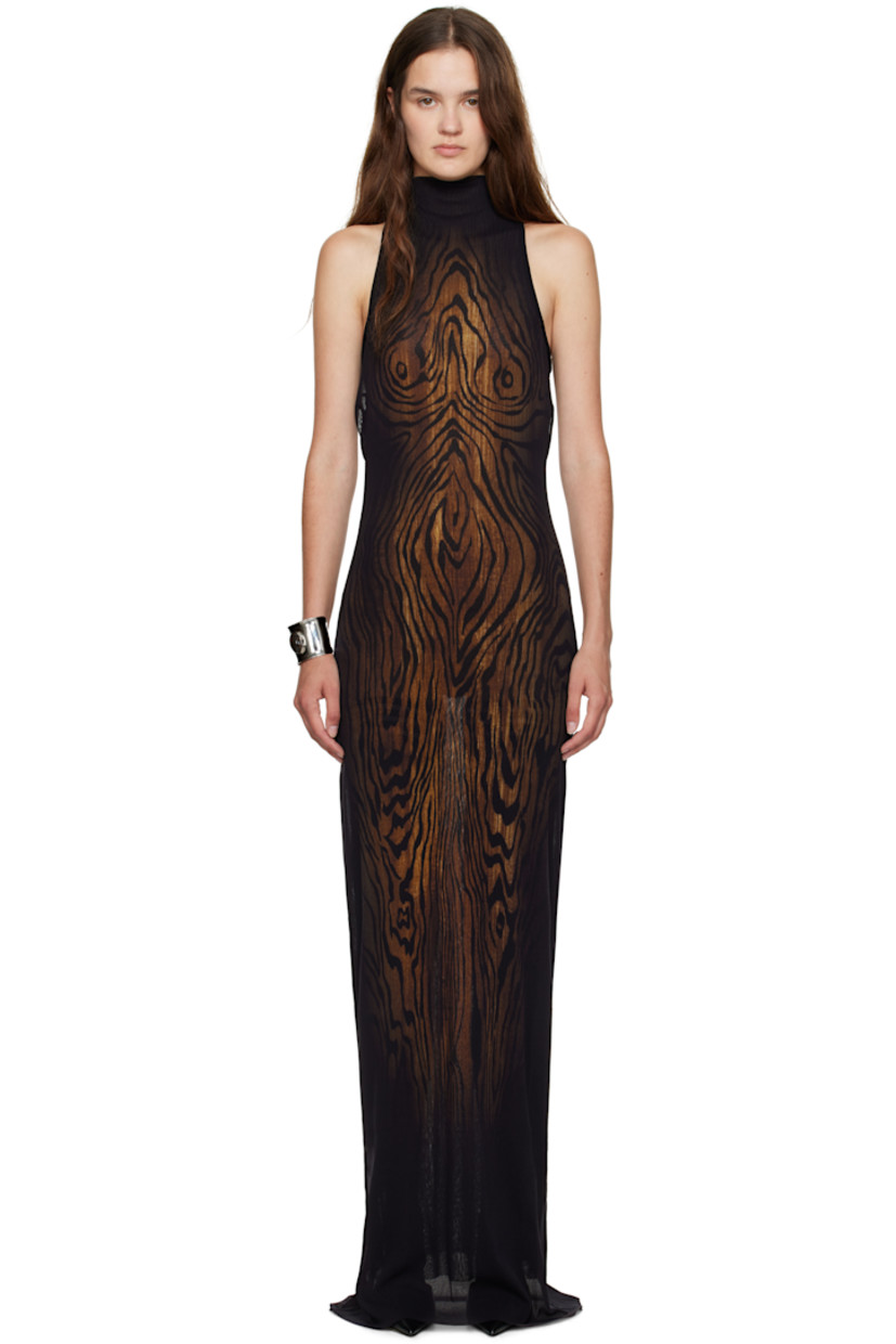 Sheer nylon tulle maxi dress.

· Graphic pattern printed throughout
· Mock neck
· Raw edge at hem 
· Racer back
· Locker loop at back collar
· Fully lined

Supplier color: Black