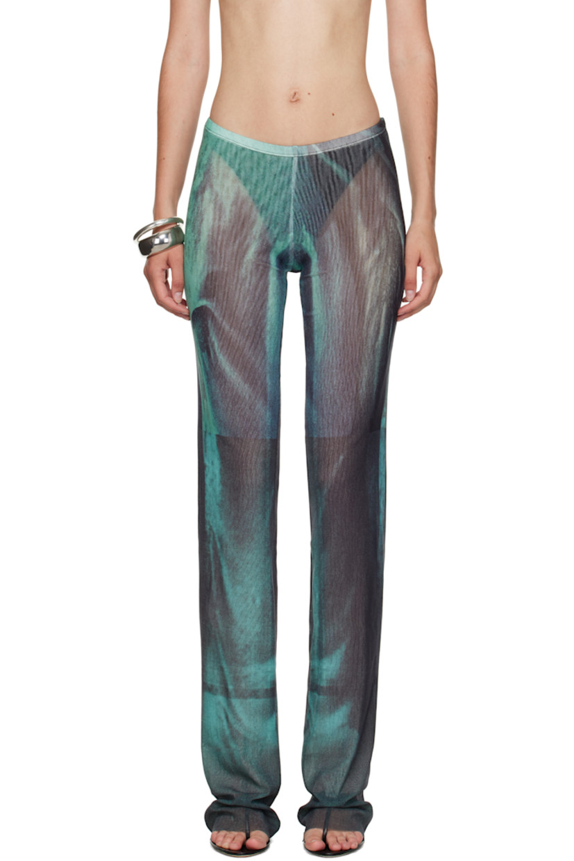 Sheer nylon tulle lounge pants.

· Straight-leg
· Graphic pattern printed throughout
· Elasticized waistband
· Raw edge at cuffs
· Locker loop at back
· Fully lined

Supplier color: Indigo