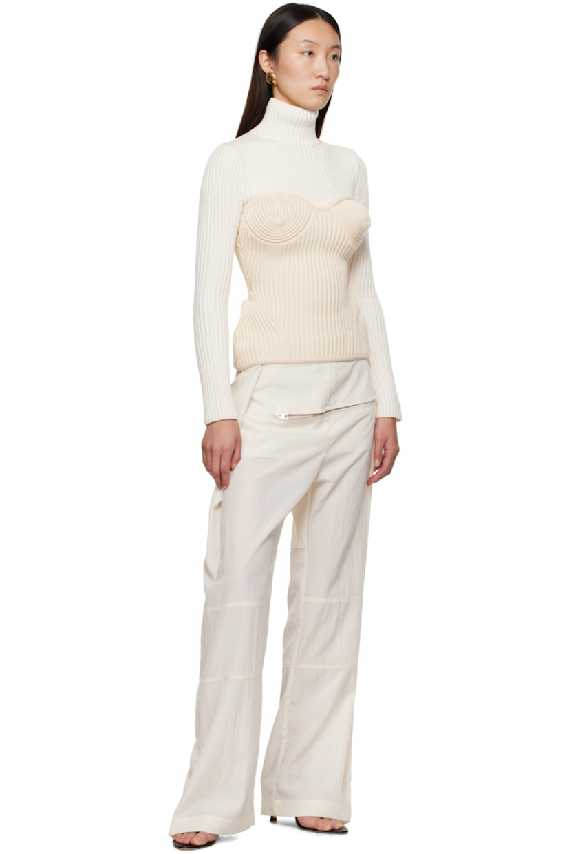 Crinkled lyocell-blend sateen trousers.

· Paneled construction
· Wide-leg
· Adjustable press-studs at waistband
· Zip pocket at front
· Zip vent at cuffs
· Locker loop at back waist
· Logo-engraved silver-tone hardware

Supplier color: Ecru