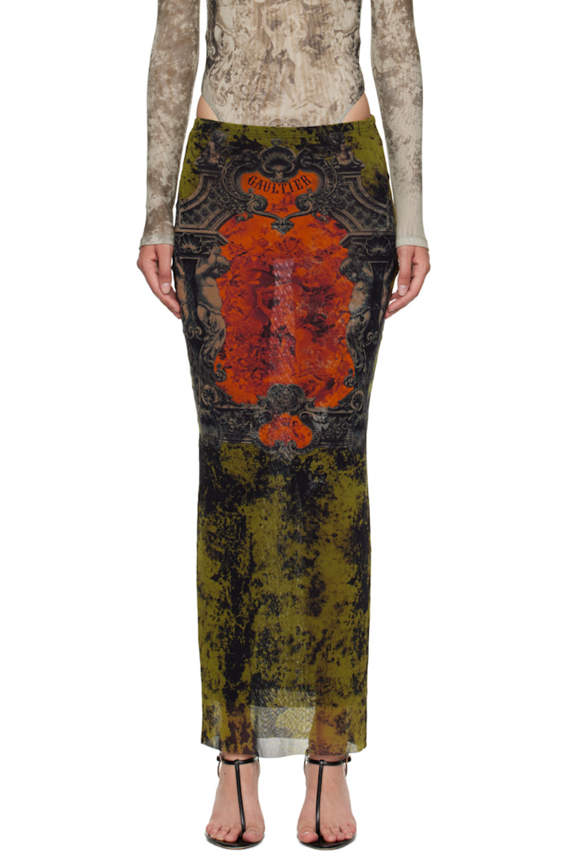 Sheer nylon tulle midi skirt.

· Graphic pattern printed throughout
· Elasticized waistband
· Raw edge at hem
· Locker loop at back
· Fully lined

Supplier color: Orange