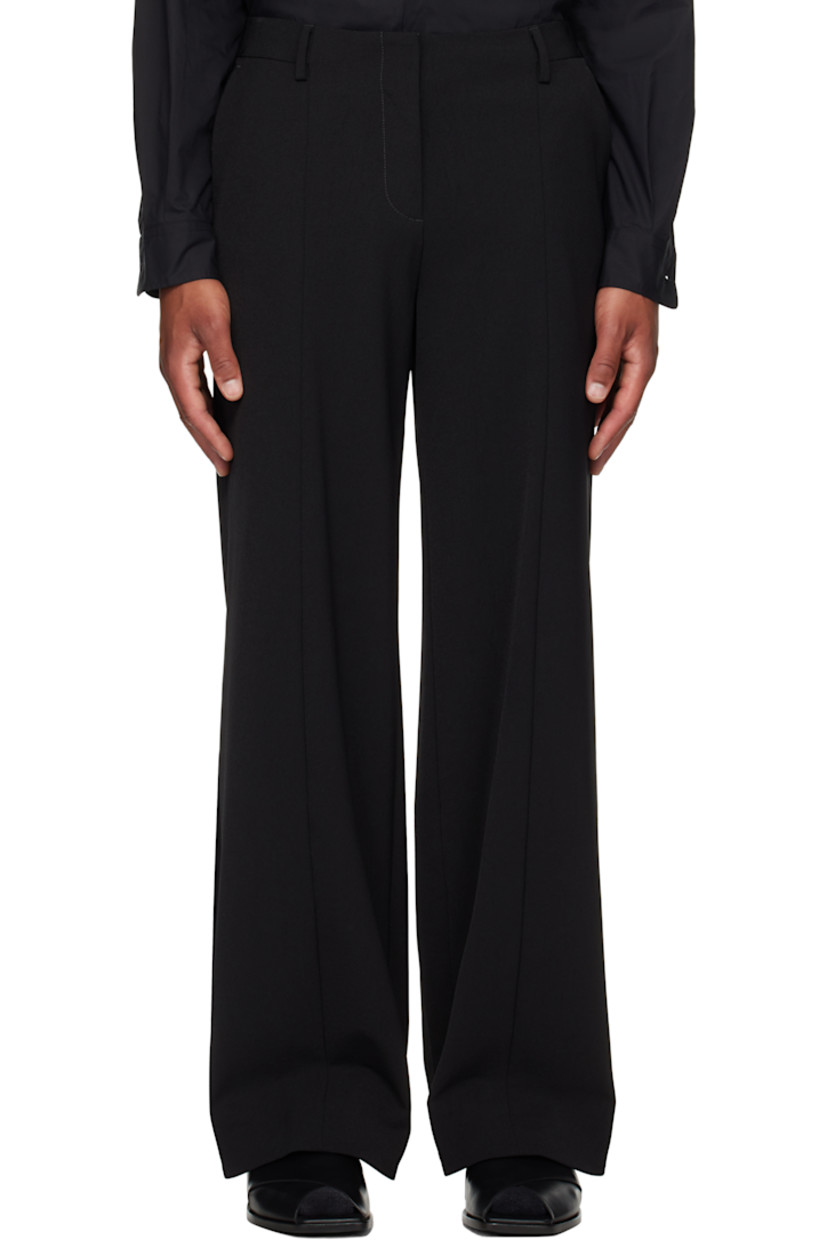 Stretch nylon twill trousers.

· Straight-leg
· Belt loops
· Four-pocket styling
· Zip fly
· Modified stirrups at hem with press-stud fastening
· Hem connects under high-heeled footwear
· Locker loop at back

Supplier color: Black