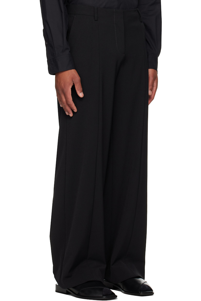 Stretch nylon twill trousers.

· Straight-leg
· Belt loops
· Four-pocket styling
· Zip fly
· Modified stirrups at hem with press-stud fastening
· Hem connects under high-heeled footwear
· Locker loop at back

Supplier color: Black