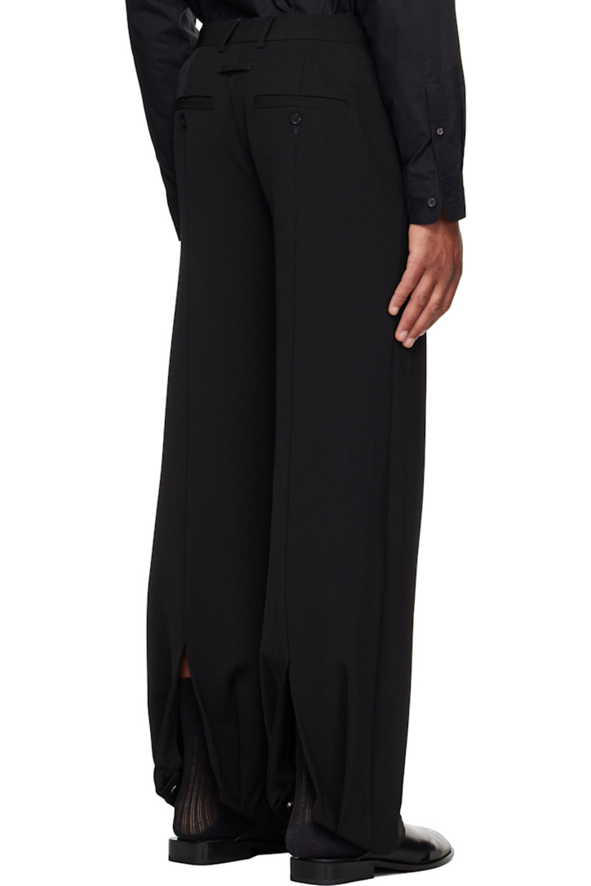 Stretch nylon twill trousers.

· Straight-leg
· Belt loops
· Four-pocket styling
· Zip fly
· Modified stirrups at hem with press-stud fastening
· Hem connects under high-heeled footwear
· Locker loop at back

Supplier color: Black