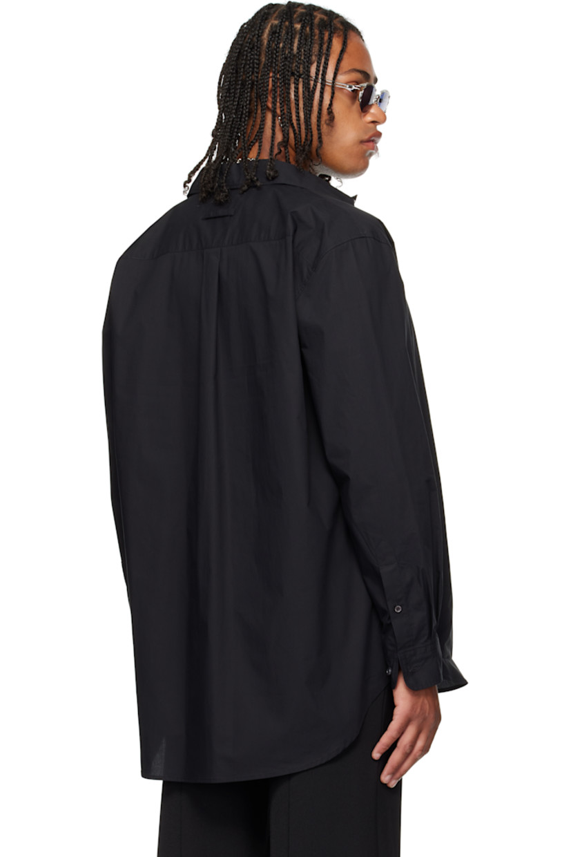 Cotton poplin shirt.

· Spread collar
· Button closure
· Logo graphic printed at front
· Shirttail hem
· Buttoned barrel cuffs
· Locker loop and box pleat at back yoke
· Mother-of-pearl hardware

Supplier color: Black