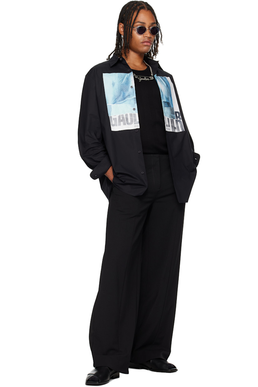 Cotton poplin shirt.

· Spread collar
· Button closure
· Logo graphic printed at front
· Shirttail hem
· Buttoned barrel cuffs
· Locker loop and box pleat at back yoke
· Mother-of-pearl hardware

Supplier color: Black
