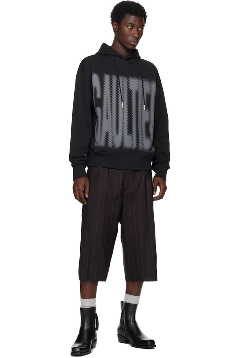 Organic cotton French terry hoodie. 

· Drawstring at hood
· Logo printed at front and back
· Seam pockets
· Rib-knit hem and cuffs
· Dropped shoulders

Supplier color: Black