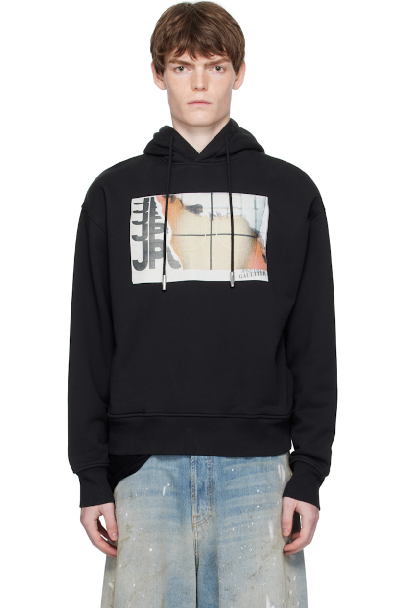 Cotton French terry hoodie.

· Drawstring at hood
· Logo graphic printed at chest
· Seam pockets at waist
· Rib-knit hem and cuffs
· Locker loop at back collar

Supplier color: Black/Orange