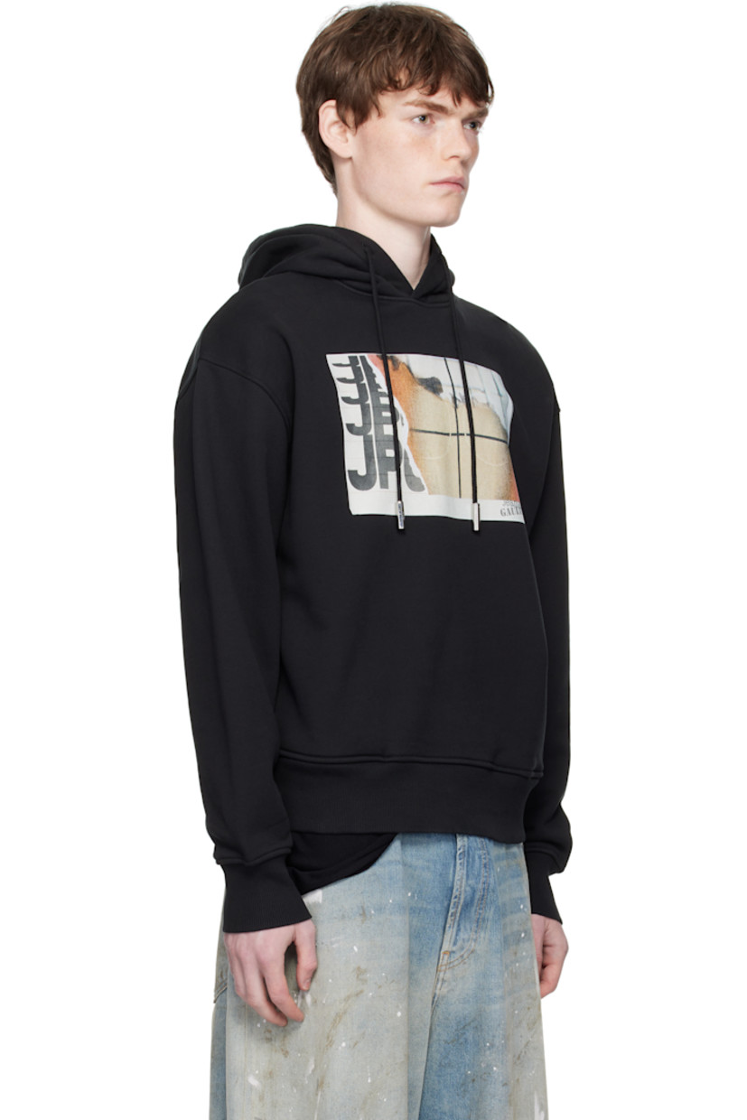 Cotton French terry hoodie.

· Drawstring at hood
· Logo graphic printed at chest
· Seam pockets at waist
· Rib-knit hem and cuffs
· Locker loop at back collar

Supplier color: Black/Orange