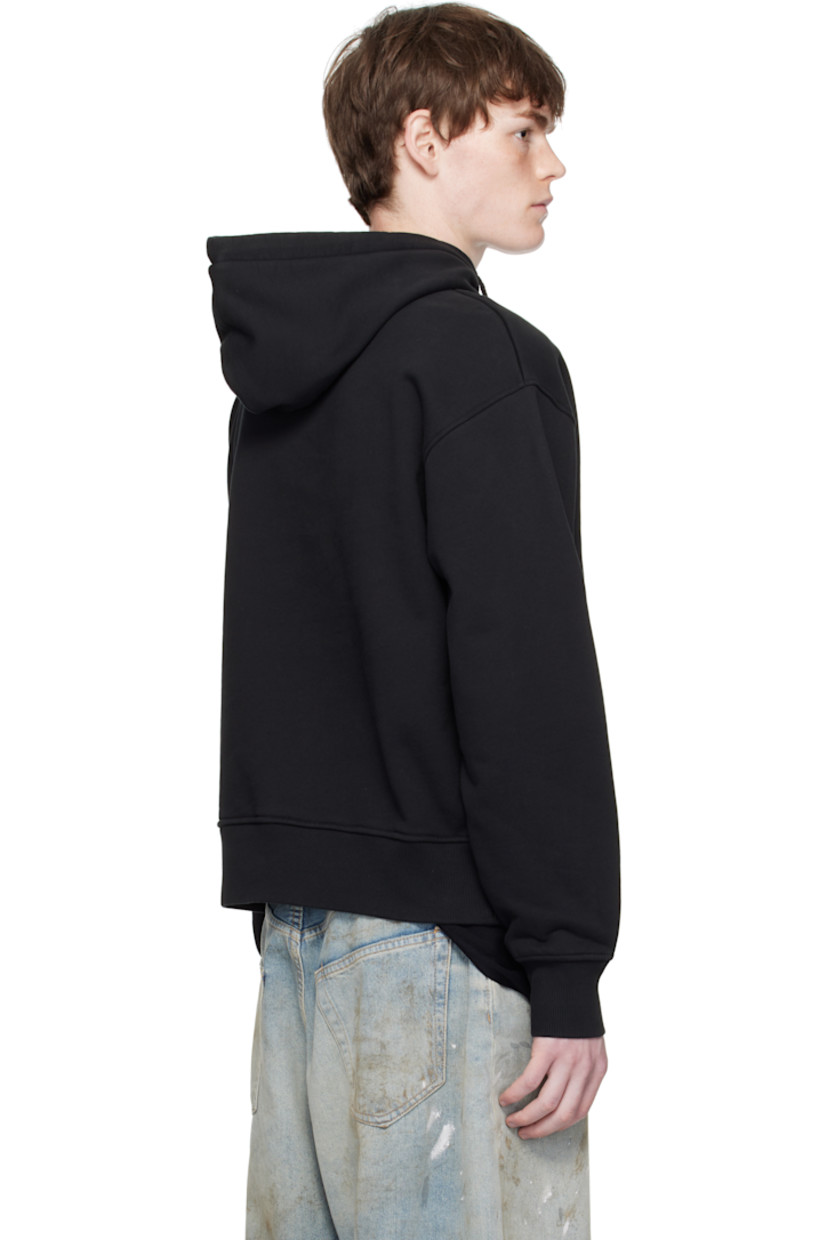Cotton French terry hoodie.

· Drawstring at hood
· Logo graphic printed at chest
· Seam pockets at waist
· Rib-knit hem and cuffs
· Locker loop at back collar

Supplier color: Black/Orange