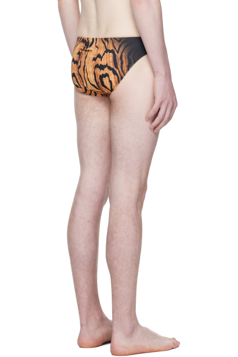Stretch jersey swim briefs.

· Graphic pattern printed throughout
· Elasticized waistband 
· Locker loop at back waist
· Fully lined

Supplier color: Black