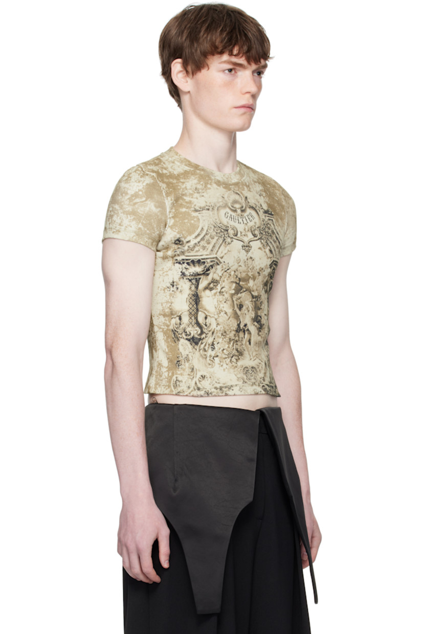 Rib-knit stretch cotton T-shirt.

· Graphic pattern printed throughout
· Crewneck
· Logo printed at chest and back
· Locker loop at back collar

Supplier color: Beige
