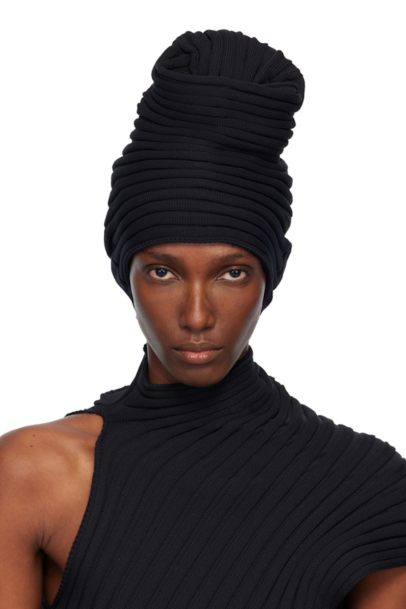 Rib-knit beanie. Sculptural crown.

Supplier color: Black