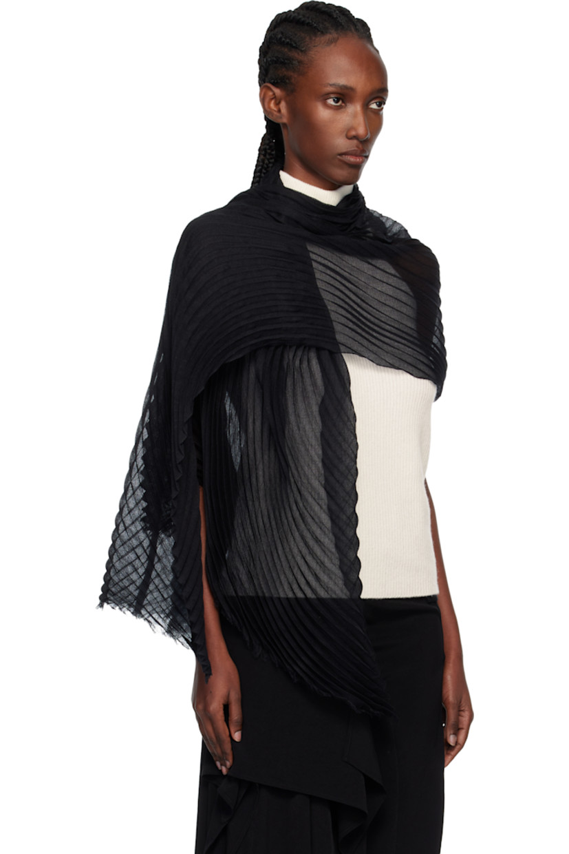 Rectangular garment-pleated silk- and wool-blend voile scarf.

· Fringed detailing at ends
· L86" x W41"

Supplier color: Black