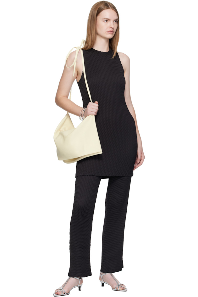 Garment-pleated tricot minidress. Round neck.

Supplier color: Black