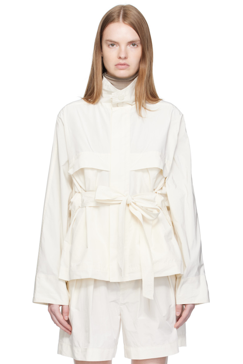 Cotton-blend taffeta jacket.

· Press-stud fastening at stand collar
· Concealed zip closure
· Storm flap at chest and back
· Welt pockets at waist
· Integrated self-tie belt
· Yoke sleeves
· Adjustable press-stud fastening at back hem
· Unlined

Supplier color: Washi white