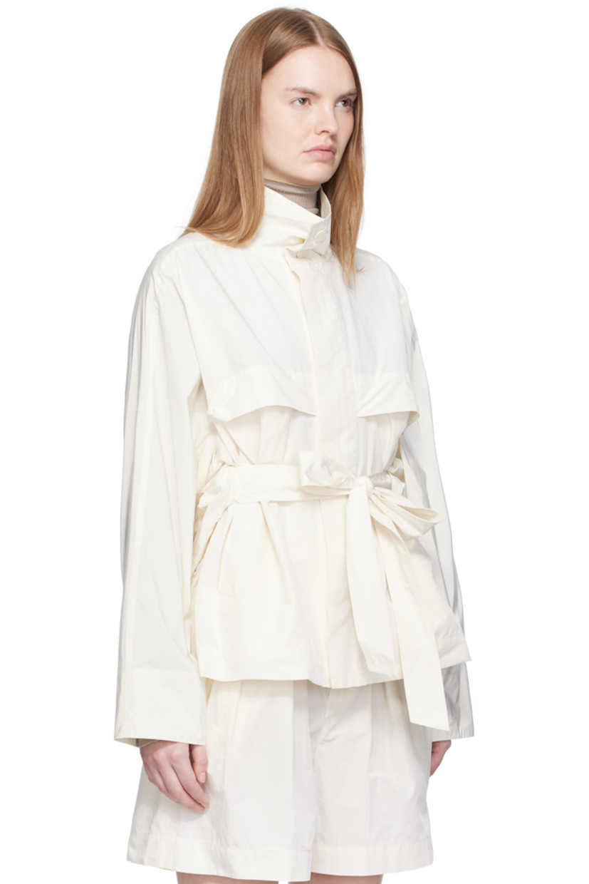 Cotton-blend taffeta jacket.

· Press-stud fastening at stand collar
· Concealed zip closure
· Storm flap at chest and back
· Welt pockets at waist
· Integrated self-tie belt
· Yoke sleeves
· Adjustable press-stud fastening at back hem
· Unlined

Supplier color: Washi white
