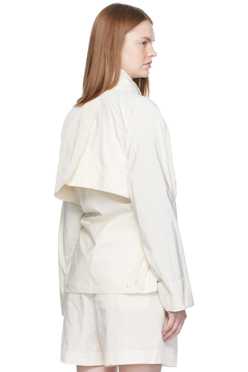 Cotton-blend taffeta jacket.

· Press-stud fastening at stand collar
· Concealed zip closure
· Storm flap at chest and back
· Welt pockets at waist
· Integrated self-tie belt
· Yoke sleeves
· Adjustable press-stud fastening at back hem
· Unlined

Supplier color: Washi white