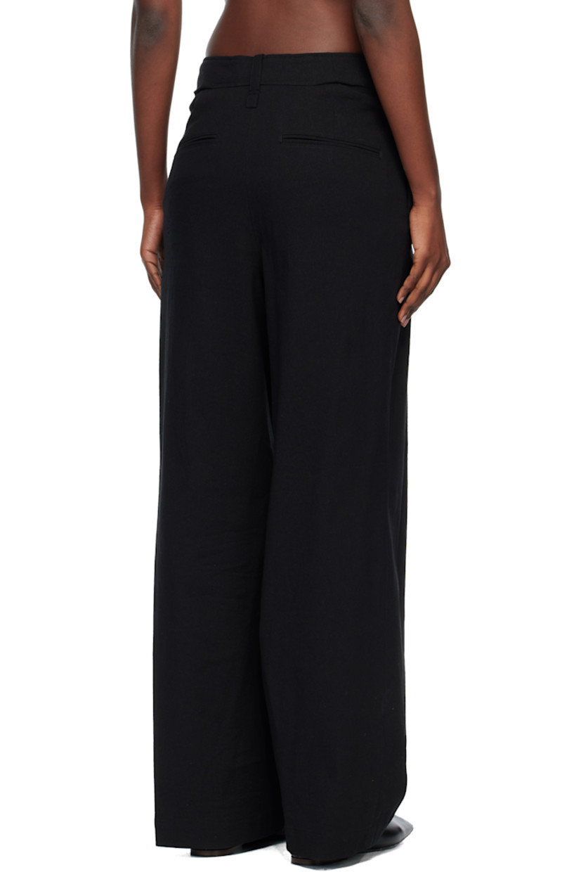 Stretch paper- and cotton-blend canvas trousers.

· Belt loops
· Four-pocket styling
· Zip fly
· Pleats at front

Supplier color: Black