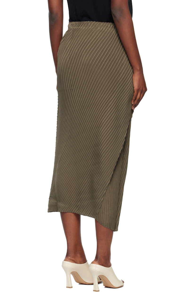 Garment-pleated recycled crêpe de chine midi skirt. 

· Elasticized waistband
· Sculptural draping at side seam

Supplier color: Khaki