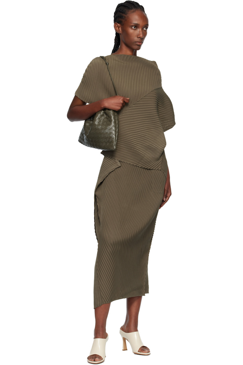 Garment-pleated recycled crêpe de chine midi skirt. 

· Elasticized waistband
· Sculptural draping at side seam

Supplier color: Khaki