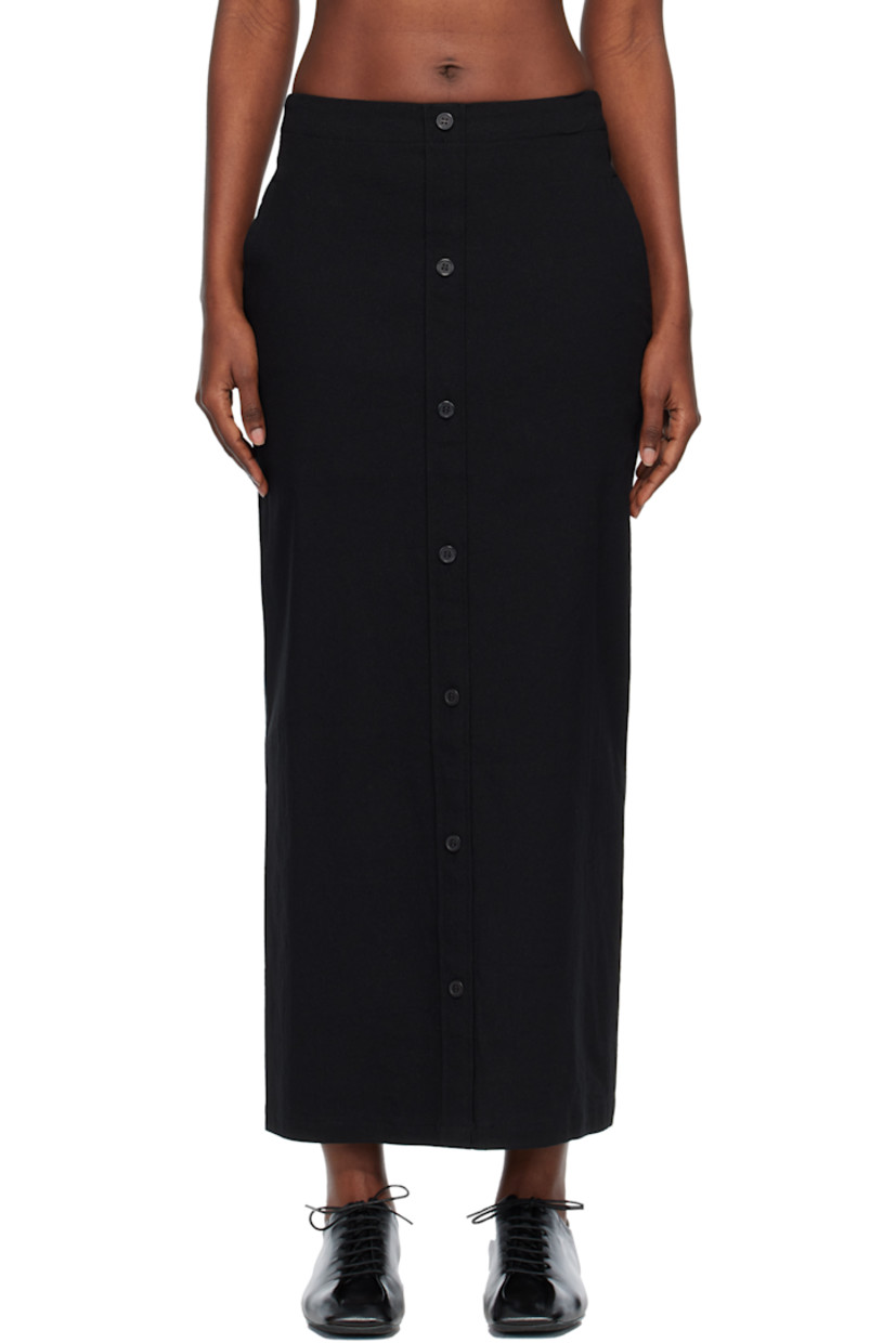 Stretch paper- and cotton-blend canvas maxi skirt.

· Two-pocket styling
· Button closure at front
· Zip closure at back

Supplier color: Black