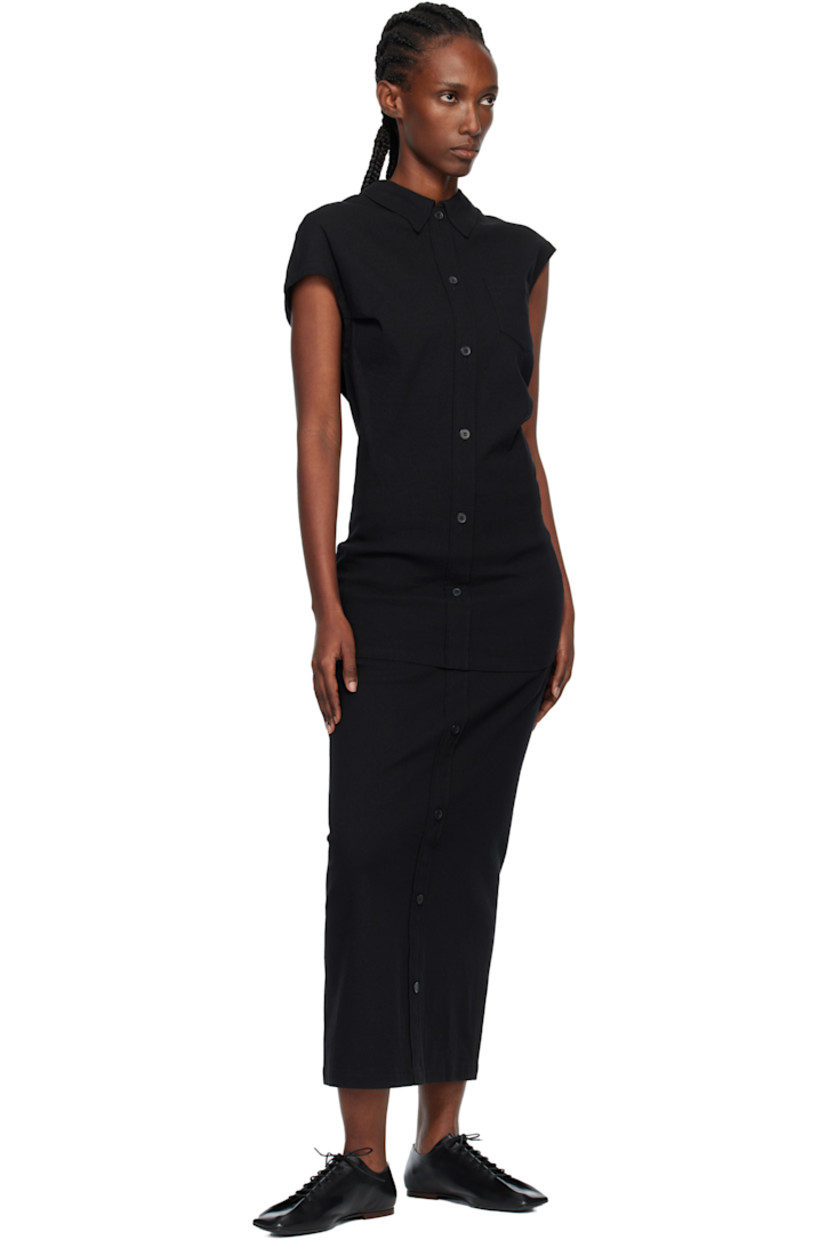 Stretch paper- and cotton-blend canvas maxi skirt.

· Two-pocket styling
· Button closure at front
· Zip closure at back

Supplier color: Black