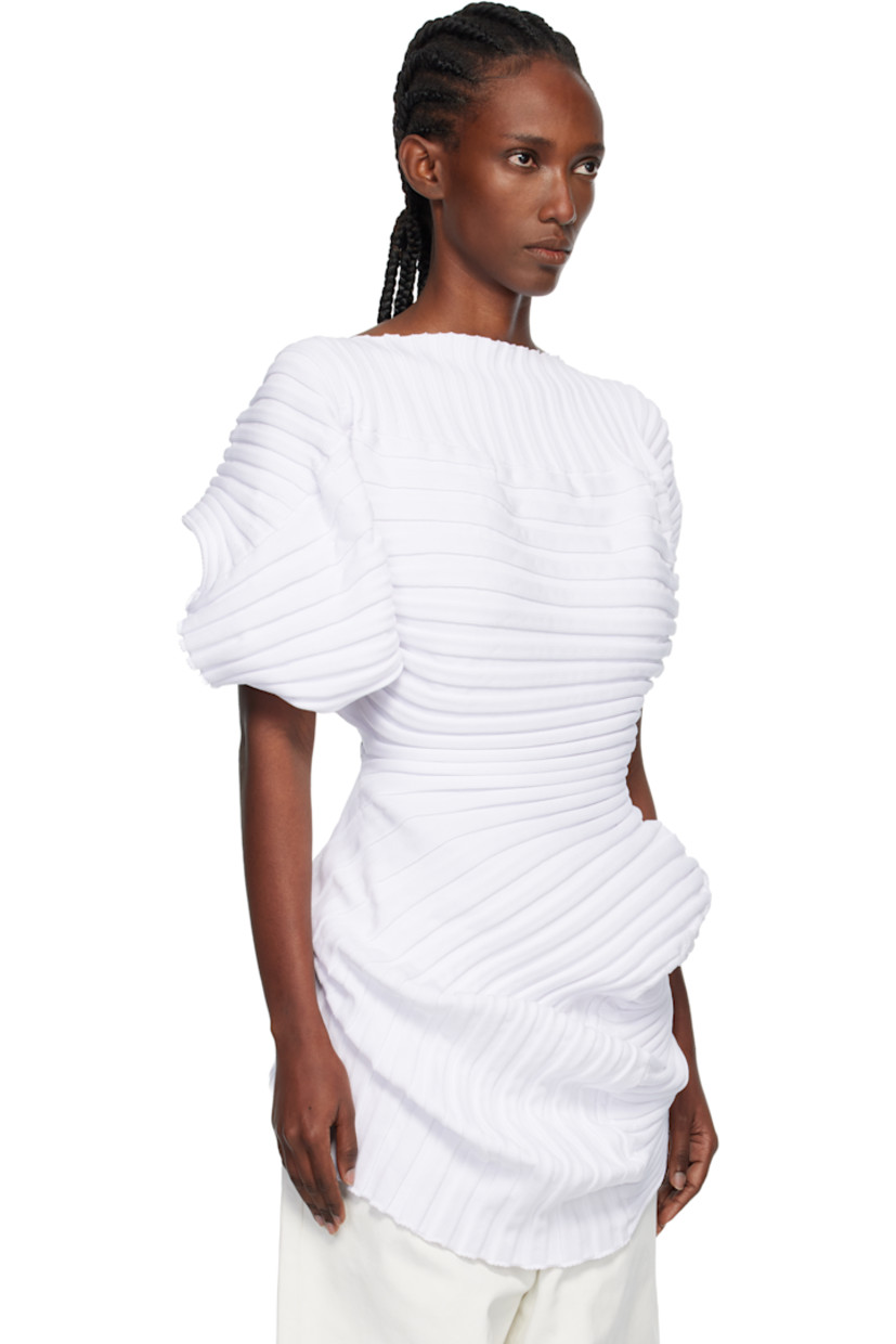 Rib-knit top.

· Boatneck
· Sculptural asymmetric hem
· Draping at side seam
· Cap sleeves

Supplier color: White