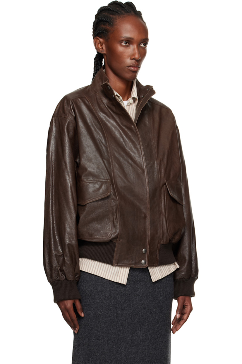 Grained leather flight-style jacket.

· Stand collar
· Concealed zip closure with press-stud placket
· Flap pockets at waist
· Rib-knit wool-blend hem and cuffs
· Welt pocket at interior 
· Full satin lining

Supplier color: Vintage Brown
