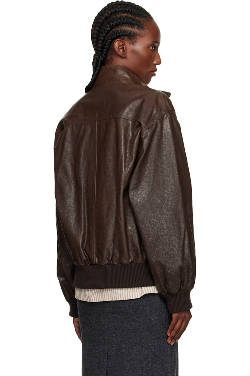 Grained leather flight-style jacket.

· Stand collar
· Concealed zip closure with press-stud placket
· Flap pockets at waist
· Rib-knit wool-blend hem and cuffs
· Welt pocket at interior 
· Full satin lining

Supplier color: Vintage Brown