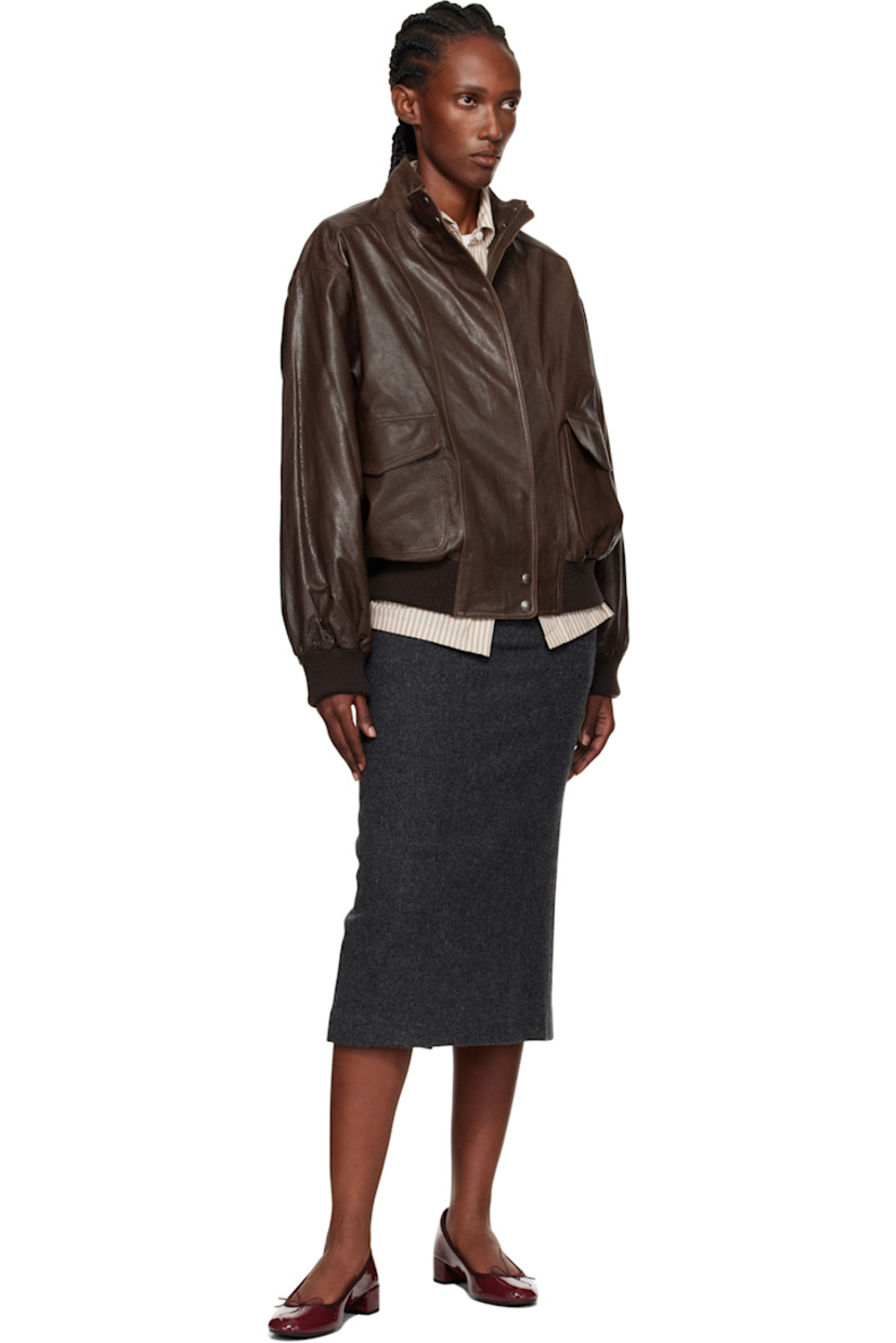 Grained leather flight-style jacket.

· Stand collar
· Concealed zip closure with press-stud placket
· Flap pockets at waist
· Rib-knit wool-blend hem and cuffs
· Welt pocket at interior 
· Full satin lining

Supplier color: Vintage Brown